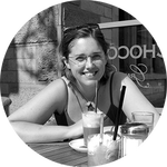 picture of Elizabeth at an outdoor cafe table