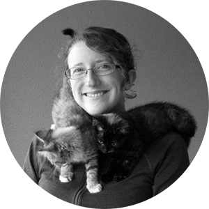 profile picture of Marie and two kittens around her neck